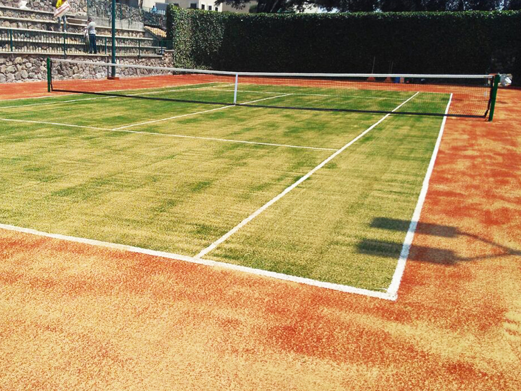Cancha de tenis pasto artificial